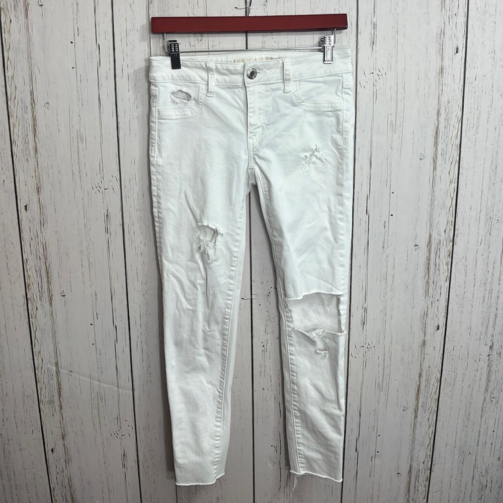 American Eagle Super Stretch X White Distressed Raw Hem Jeans Size 0